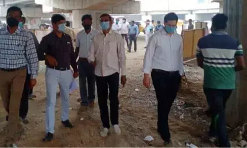 VMRDA Commissioner P Koteswara Rao inspecting the construction works of NAD flyover in Visakhapatnam on Sunday