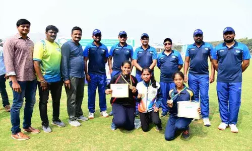 Divisional Railway Manager, Waltair Division, Chetan Kumar Shrivastava with the athletes of Waltair Railway Athletic Academy.