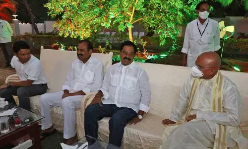 Deputy Chief Minister Narayana Swamy and Tirupati MLA B Karunakar Reddy at the ‘At Home’ hosted by TTD EO K S Jawahar Reddy in Tirupati on Tuesday