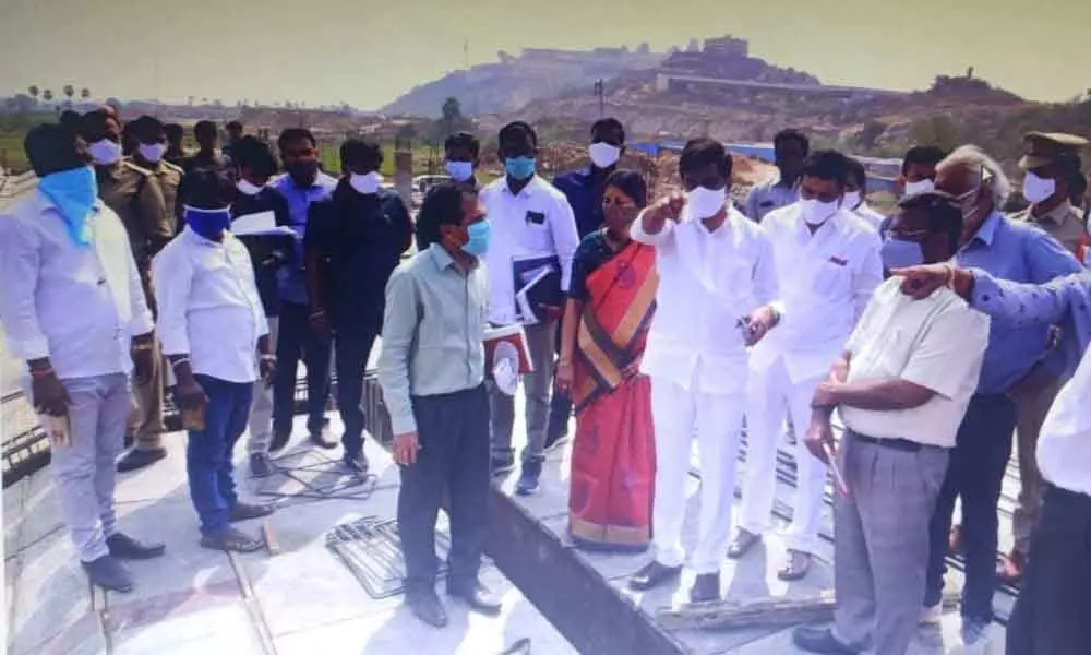 R&B Minister Vemula Prashanth Reddy inquiring the officials the progress of works at Yadadri temple on Wednesday