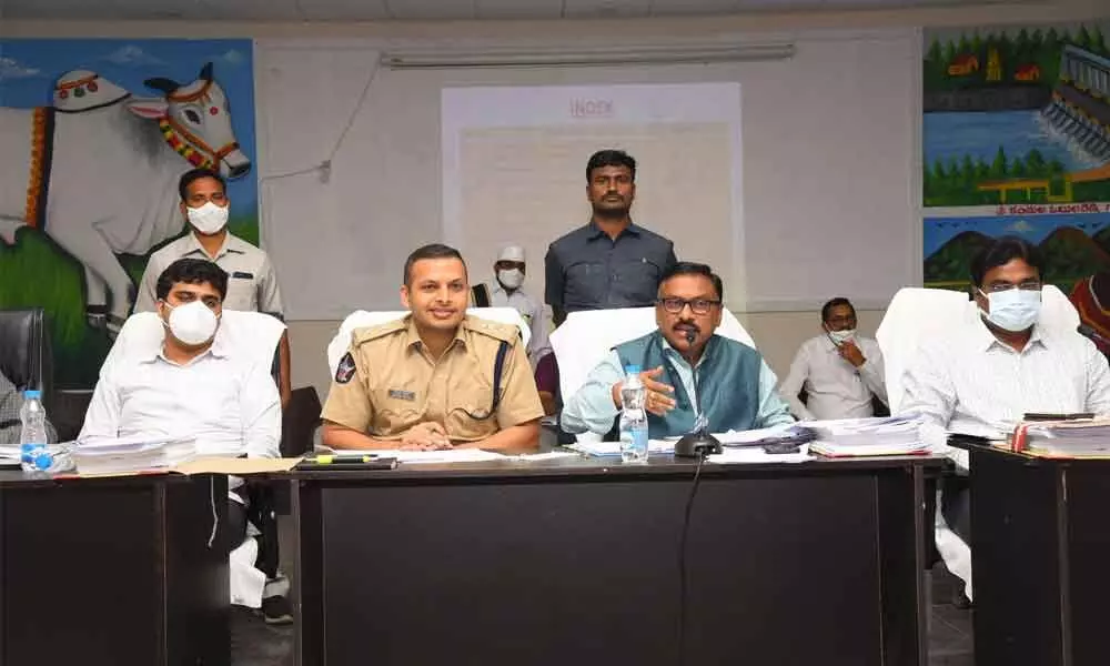 Collector Dr Pola Bhaskara and SP Siddharth Kaushal addressing the officials on conduct of panchayat elections in Ongole on Wednesday