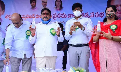 Panchayat Raj Minister Errabelli Dayakar Rao releasing bottled drinking water of Mission Bhagiratha in Thorrur on Wednesday
