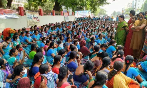 ICDS PD Lakshmi Devi interacting with the protesting Anganwadi workers and helpers in Ongole
