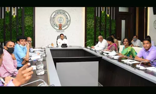 Chief Minister Y S Jagan Mohan Reddy in a review on houses for poor at his camp office on Wednesday