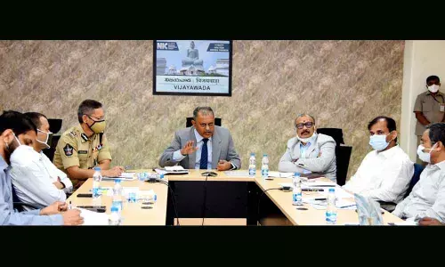 State Election Commissioner N Ramesh Kumar taking part in a videoconfernce with district officials in Vijayawada