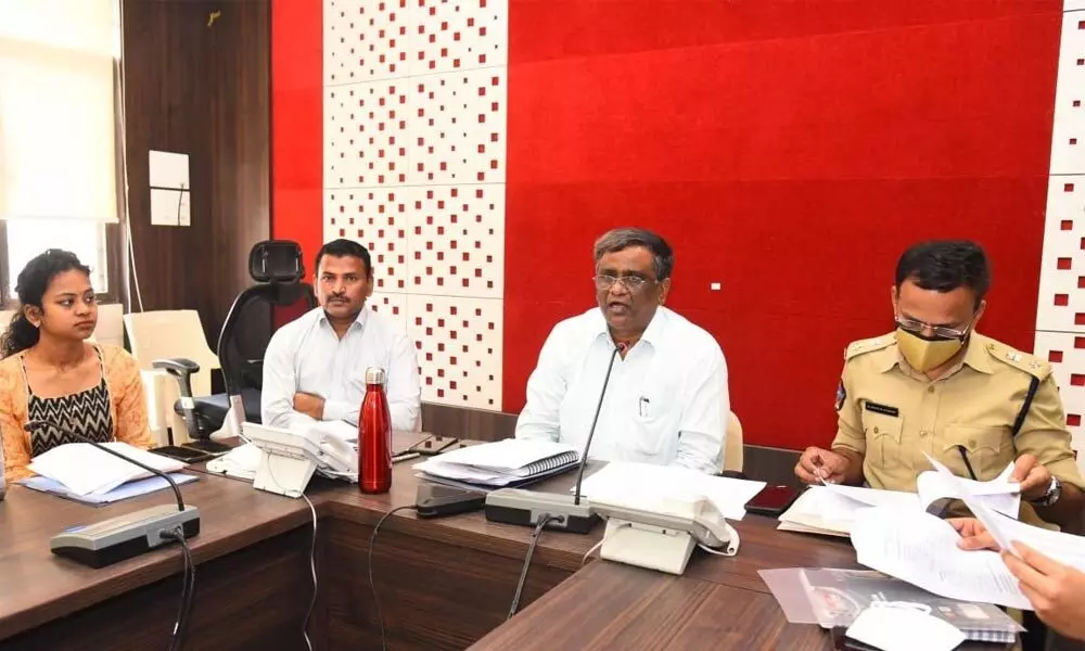 In-charge District Collector K Markendeyulu addressing the press at Chittoor on Thursday. SP Senthil Kumar is also seen.