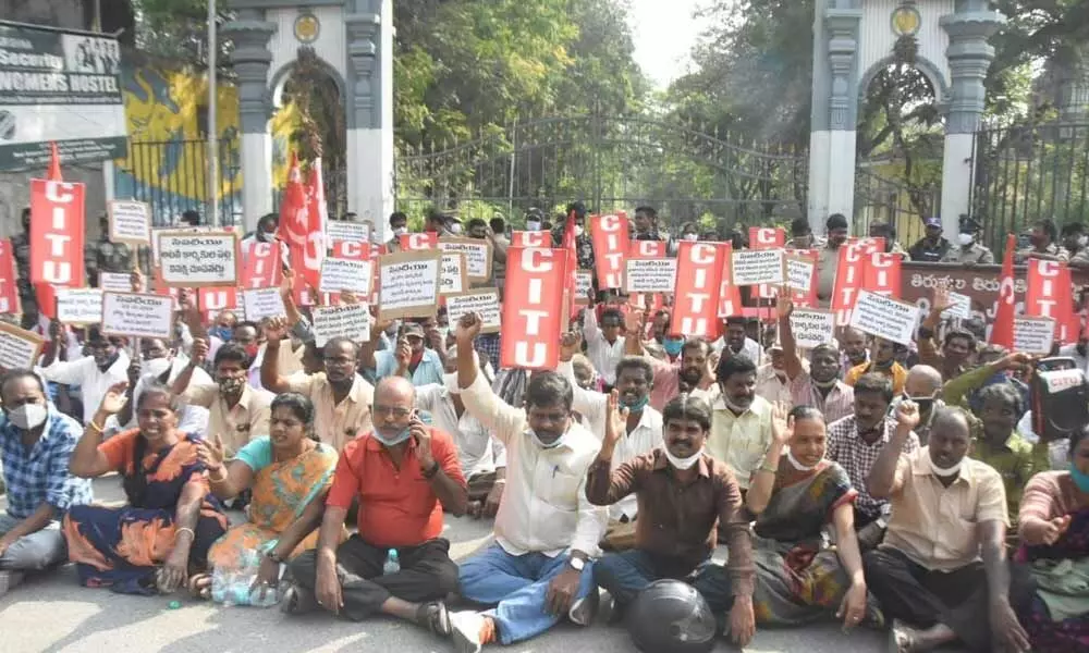 Contract employees in TTD forest department staging a dharna in front of TTD Administrative building in Tirupati on Thursday