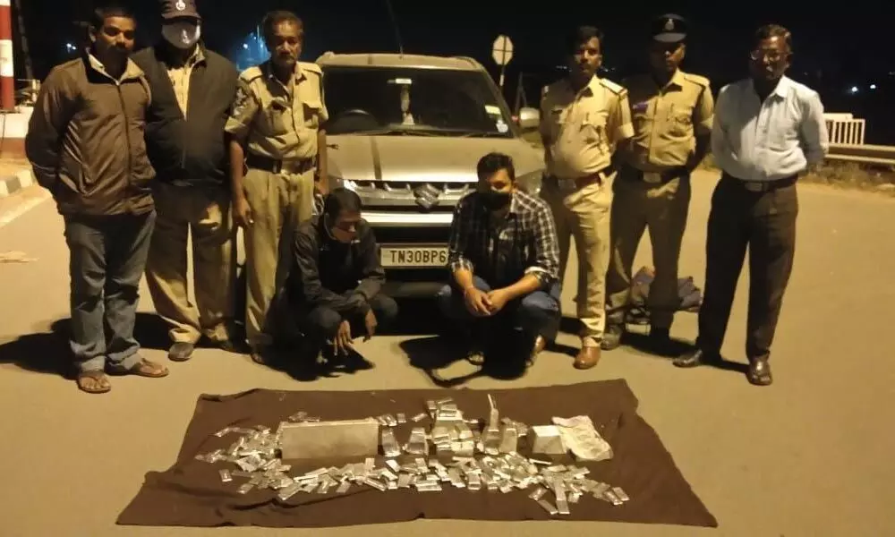 SEB Circle Inspector N Lakshmi Durgaiah with the seized silver articles at Panchalingala border check post on Thursday