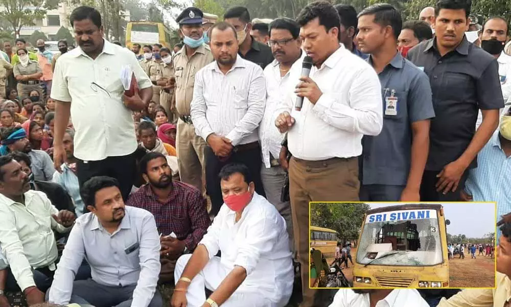 Minister for Animal Husbandry S Appala Raju addressing agitators at Sri Sivani College of Engineering at Chilakapalem village in Etcherla on Thursday