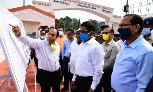 General Manager of ECoR Vidya Bhushan and Divisional Railway Manager, Waltair, Chetan Kumar Shrivastava at the newly built entrance arch at Visakhapatnam railway station on Wednesday