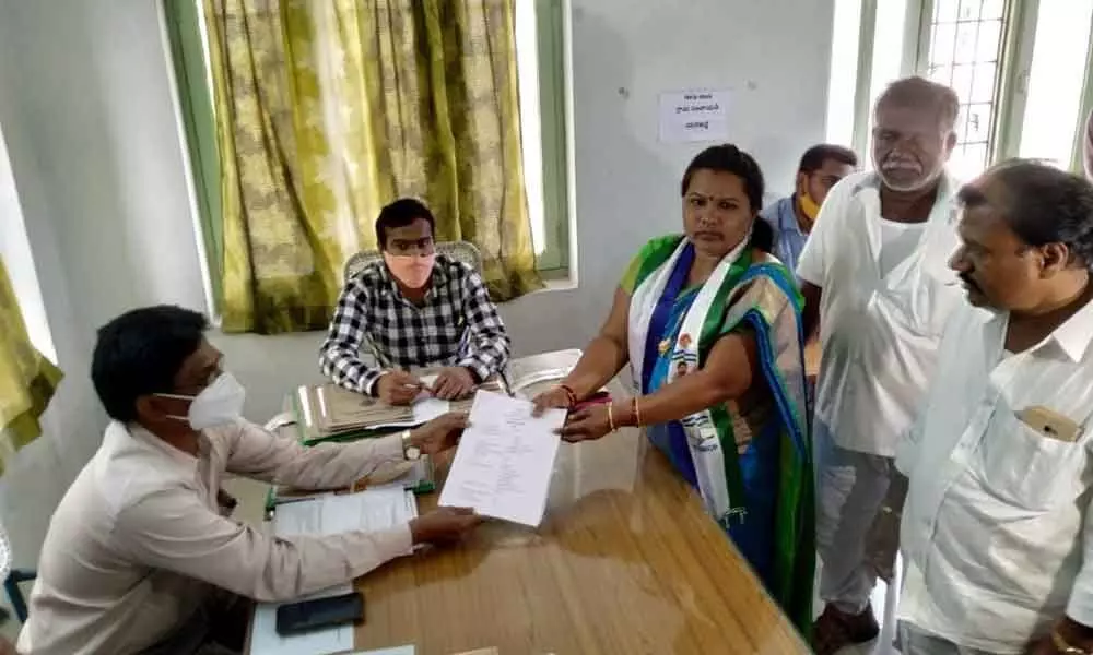 Tammisetty Ramulamma filing nomination as a candidate for Sarpanch of Yerajarla village panchayat at MPDO office in Ongole on Friday