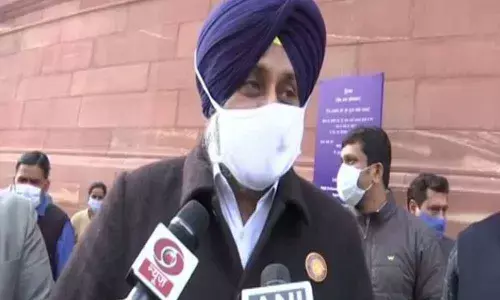 Shiromani Akali Dal (SAD) leader Sukhbir Singh Badal outside Parliament on Friday .