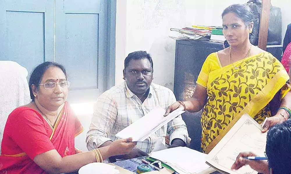 K Vijayalakshmi and V Dhanalakshmi (right) filing nominations for  ward member posts  at Ramavarappadu panchayat office near Vijayawada