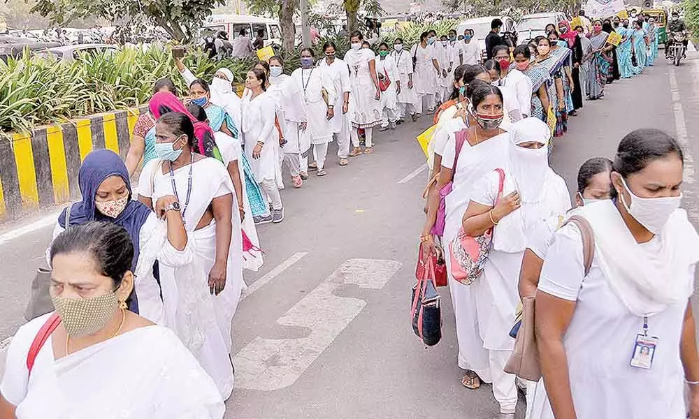 Medical and Health Department staff taking part in the pulse polio awareness rally in Vijayawada on Saturday