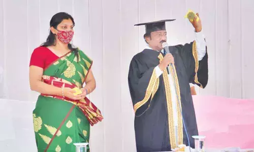 Mayor Gunda Prakash Rao and Municipal Commissioner Pamela Satpathy releasing the GWMC diary at the general body meeting in Warangal
