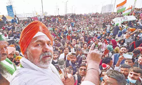 BKU spokesperson Rakesh Tikait addresses during a protest over Centres farm reform laws, at Ghazipur border in New Delhi on Saturday