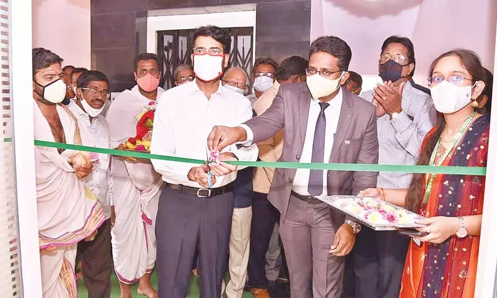 Collector D Muralidhar Reddy inaugurating new building of Chaitanya Godavari Grameena Bank in Kakinada