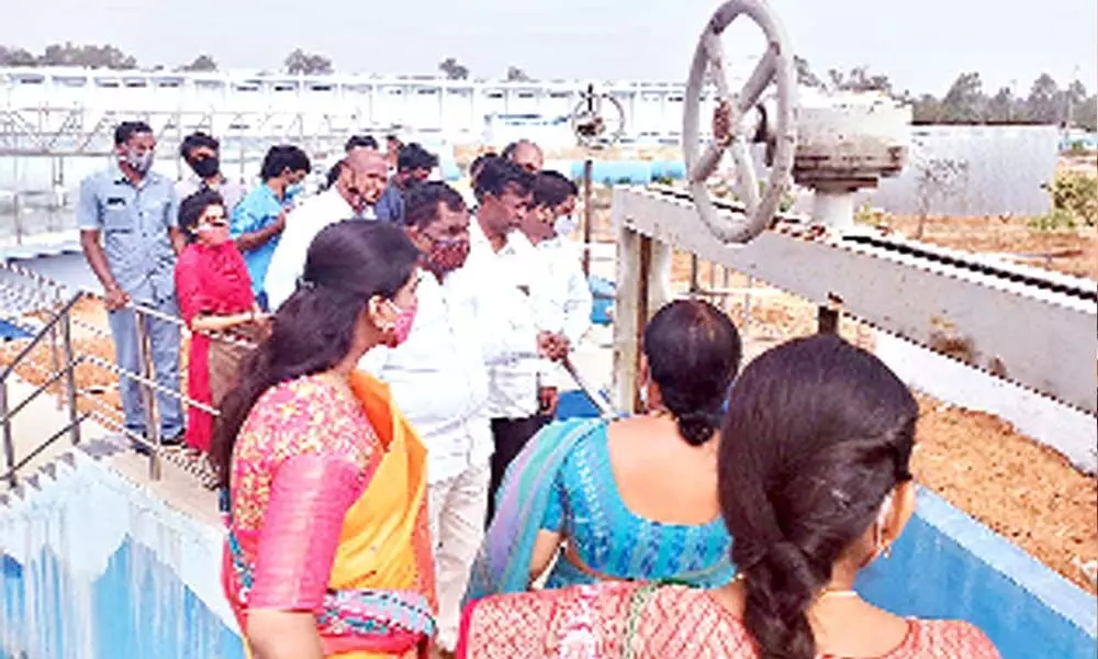 Mission Bhagiratha Executive Engineer Ch Padma Latha with officials inspecting MB works in Shadnagar on Monday