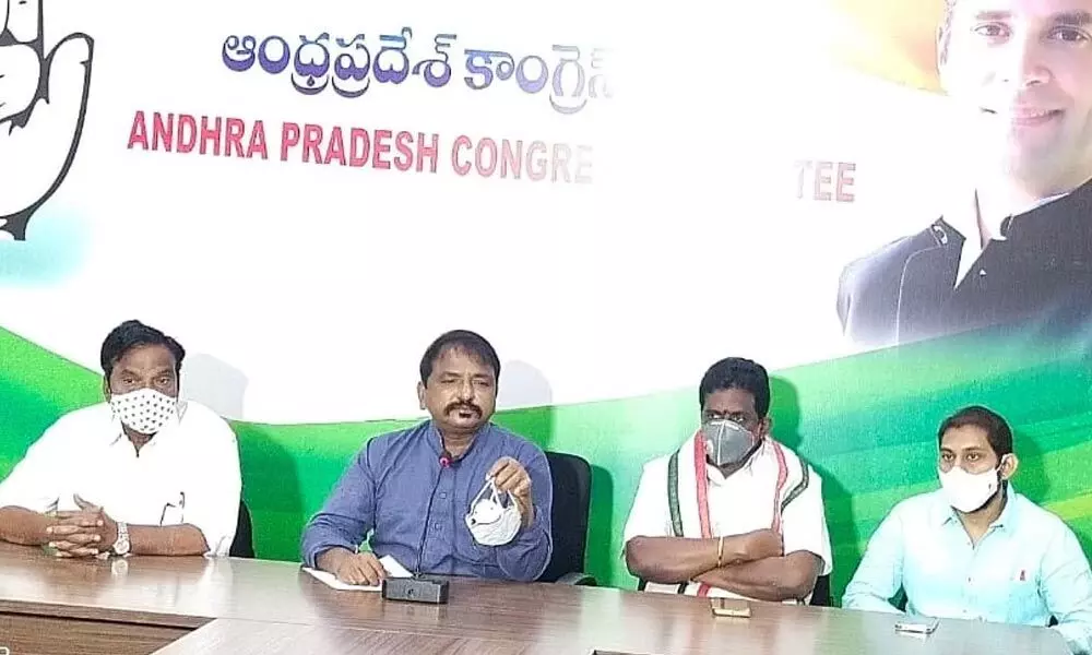 APCC president Dr Sake Sailajanath addressing the media in Vijayawada on Monday