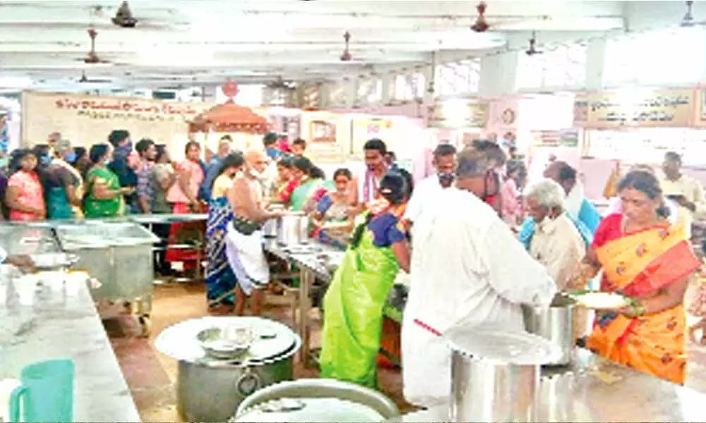 Food being served to devotees at the Annadanam centre in Bhadrachalam on Monday.