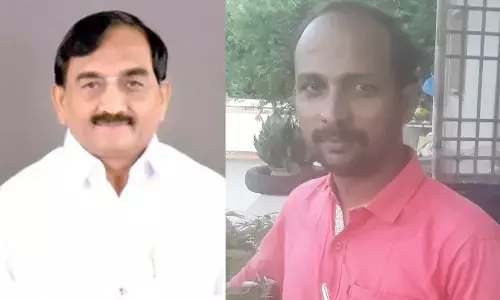 DCC president P Seshanjeneyulu and Small trader Yarava Prakash