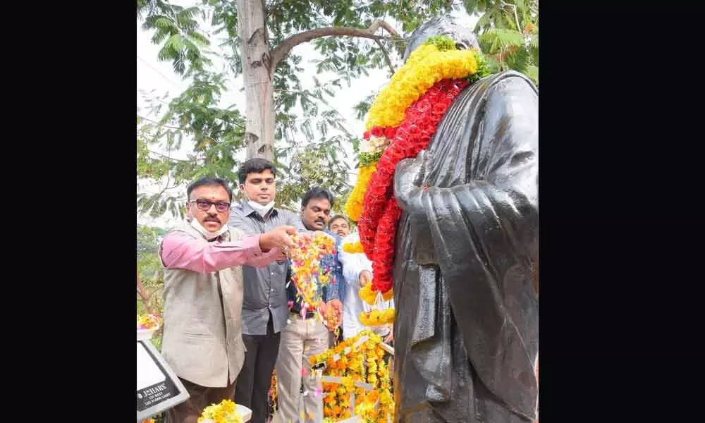 Collector DrPola Bhaskara, Joint Collectors JV Murali and TS Chetan paying tributes to Prakasam Pantulu as part of 52nd Prakasam district