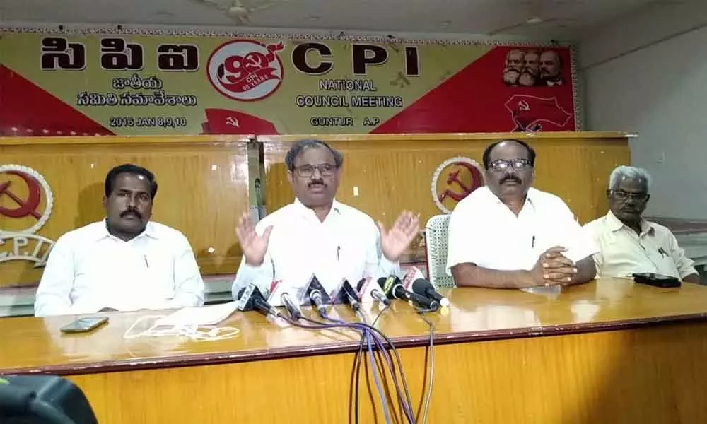 CPI State assistant secretary Muppalla Nageswara Rao addressing media in Guntur on Tuesday