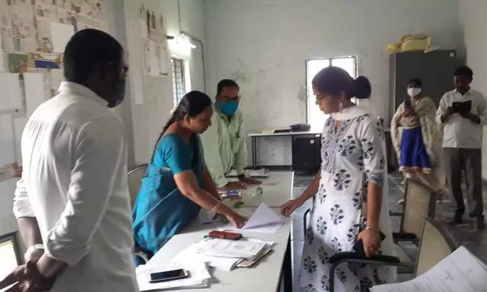 District Deputy Election Officer Kalpana Kumari inspecting the nomination process at Devanur village in Koilkuntla mandal on Tuesday