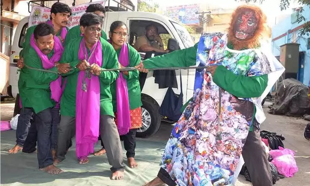 Artistes performing  a street play on plastic menace in Visakhapatnam as a part of the GVMC’s month-long campaign against plastic use