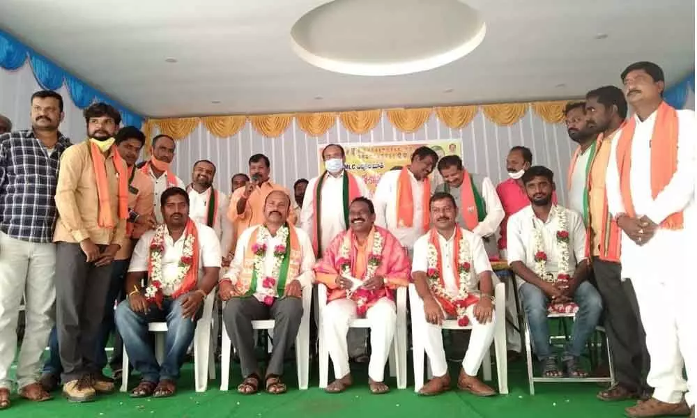  Warangal Rural BJP district president Kondety Sridhar among others felicitated by the party workers in Warangal on Saturday