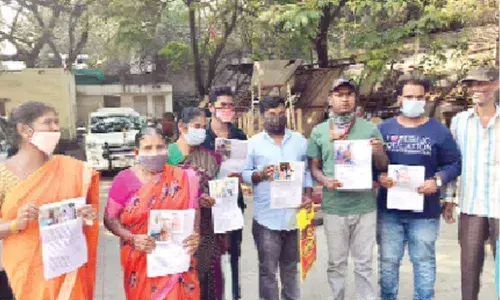 Flood victims stage protest in front of GHMC office