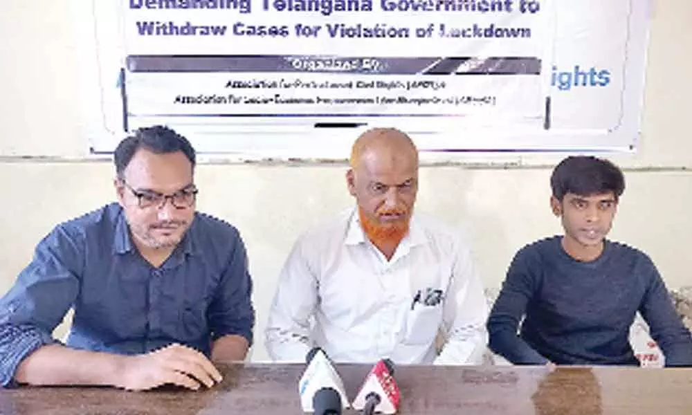 Activists demand cases withdrawal