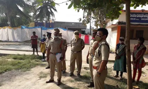 Narsipatnam Assistant Superintendent of Police Tuhin Sinha inspecting polling stations in the sensitive areas of Anakapalle division on Monday.