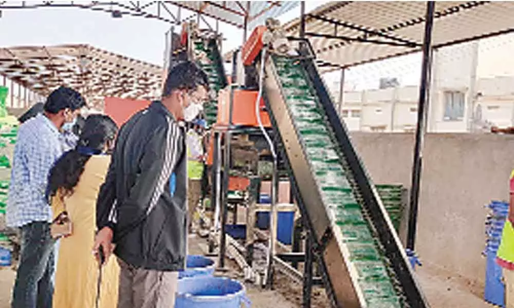 Smart City Corporation CEO Swapnil Dinakar Pundkar inspecting the solid waste management unit in Kakinada on Tuesday