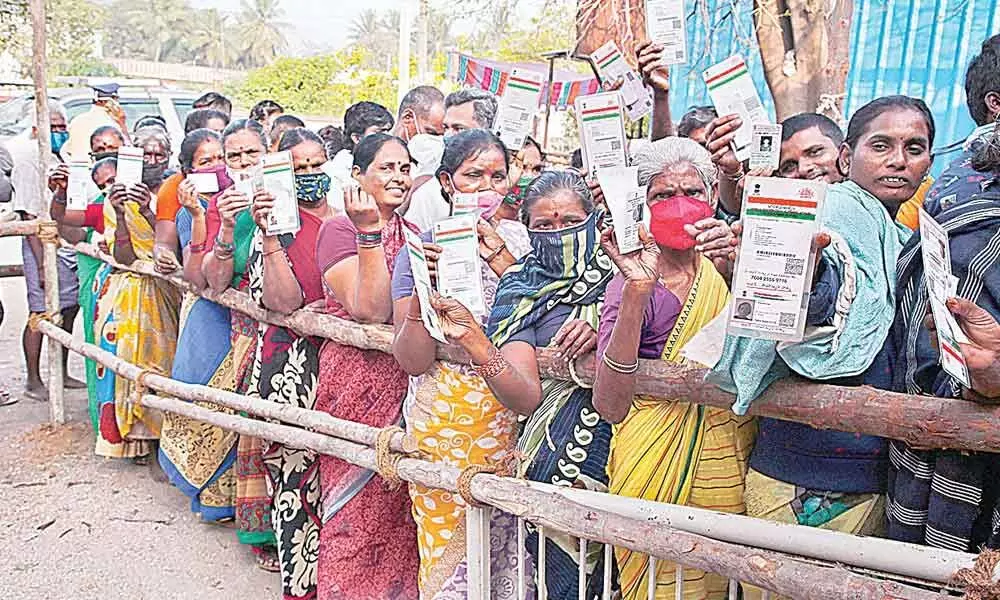 Women voters showing identity cards at polling station  in Kammapalli in Chittoor district during Phase-1 polling on Tuesday.  Photo: Kalakata Radhakrishna