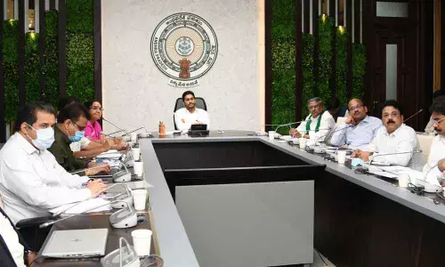Chief Minister Y S Jagan Mohan Reddy reviewing agriculture, Amul project and Janata Bazaars with officials at his camp office in Tadepalli on Tuesday