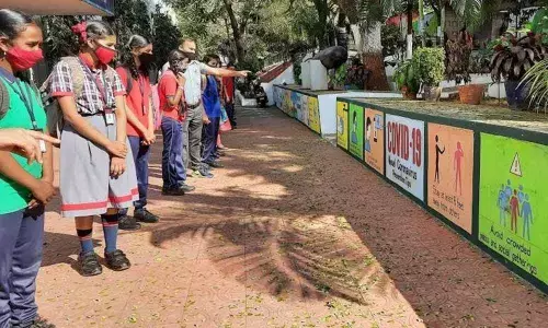 Students of Kendriya Vidyalaya No 2, Nausenabaugh, admiring the freshly-painted walls on the campus in Visakhapatnam