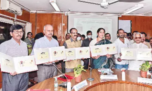 Satyavathi Rathod, the Tribal Welfare Minister of Telangana, and S Rajendar Kumar, the Chief Postmaster General of Telangana circle, and others releasing a special cover to mark the 282nd birth anniversary of Sadguru Shri Sevalal Maharaj, a great revolutionary of India, at Dak Sadan in Abids on Wednesday. 		 	Photo: Srinivas Setty