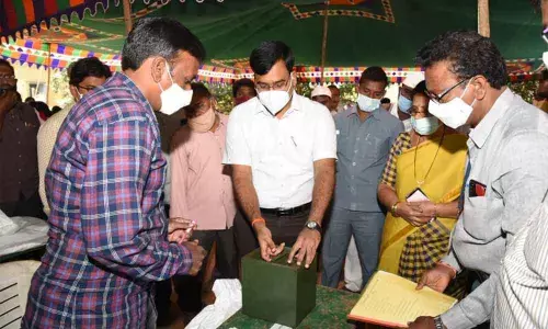 District Collector K V N Chakradhar Babu inspecting polling arrangements in Atmakur division on Friday