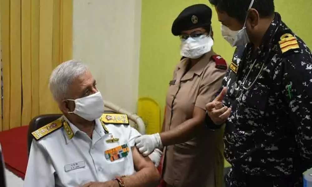 Flag Officer Commanding-in-Chief and ENC Vice Admiral Atul Kumar Jain being administered Covid-19 vaccine at INHS Kalyani