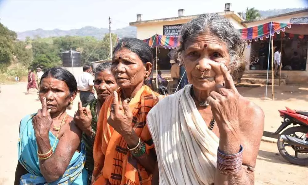 Residents of Sampangipadu village who walked 8 kilometres through forests to reach the nearest polling centre to cast their votes during the second phase of panchayat polls in Vizianagaram district on Saturday
