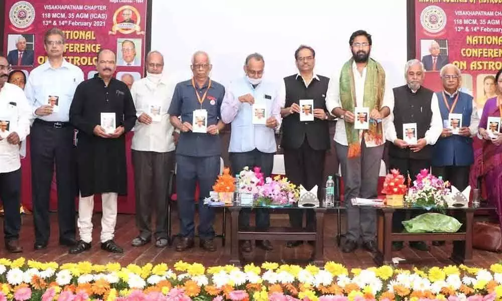 Goa Chief Secretary Parimal Rai, among others releasing a book on ‘Medical Astrology and Spine’ during the ICAS national conference at GITAM campus on Saturday