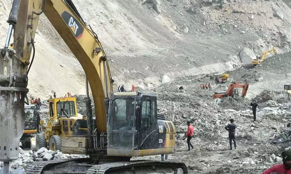 Rescue and restoration work at Raini village, after a glacier burst on Feb. 7 in Joshimath triggered a flash flood, in Chamoli district of Uttarakhand on Saturday