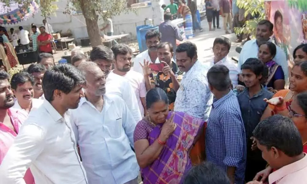 MP Lavu Sri Krishnadevarayalu interacting with locals at Rentachintala in Guntur district on Sunday