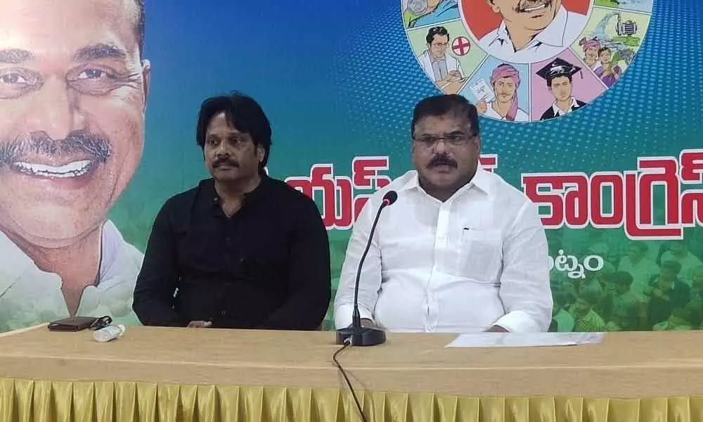 Minister for Municipal Administration and Urban Development Botcha Satyanarayana speaking at a press conference in Visakhapatnam on Sunday. MP MVV Satyanarayana is also seen.