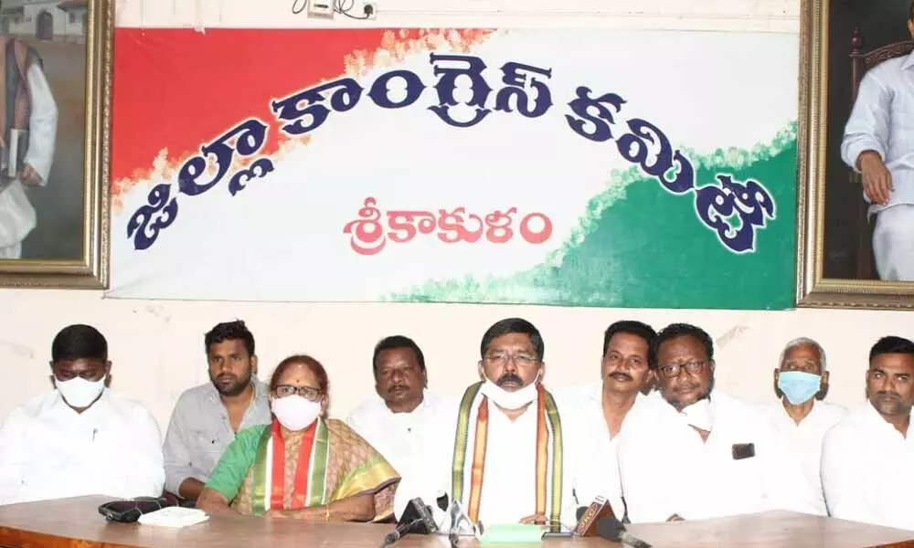 Former MLC and Congress leader G Rudra Raju and party district president B Satyavathi speaking to media in Srikakulam on Sunday