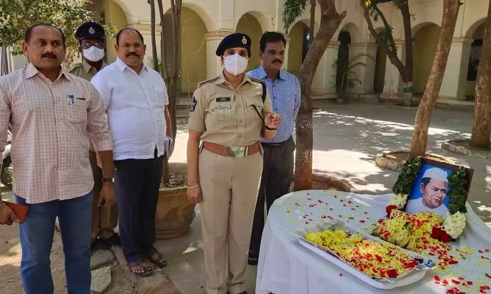 Additional SP (Admin) Supraja paying rich floral tributes to the portrait of former Chief Minister of Andhra Pradesh Damodaram Sanjivayya at the Urban District Police Office in Tirupati on Sunday