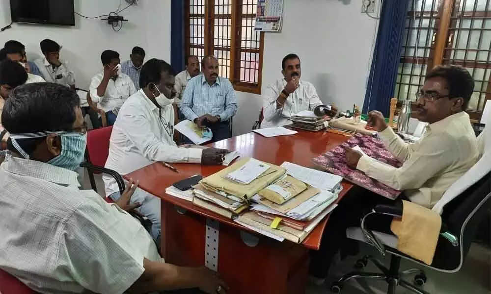 Municipal Commissioner P Viswanath conducting a review meeting with officials over poll arrangements in Chittoor on Monday