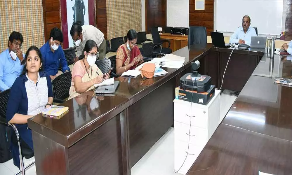 Krishna District Collector Md Imtiaz and other officials attending the videoconference on Covid vaccination in Vijayawada on Monday