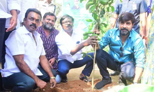 Transport Minister P Ajay Kumar and Tollywood actor Srikanth planting saplings in Khammam on Tuesday under ‘Koti Vriksharchana programme